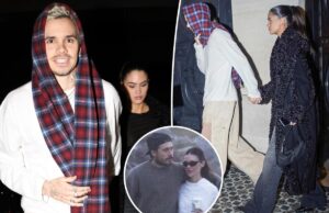 Ромео Бекхэм улыбается во время прогулки с подругой Ким Тернбулл в КПК, поскольку семейный раскол углубляется